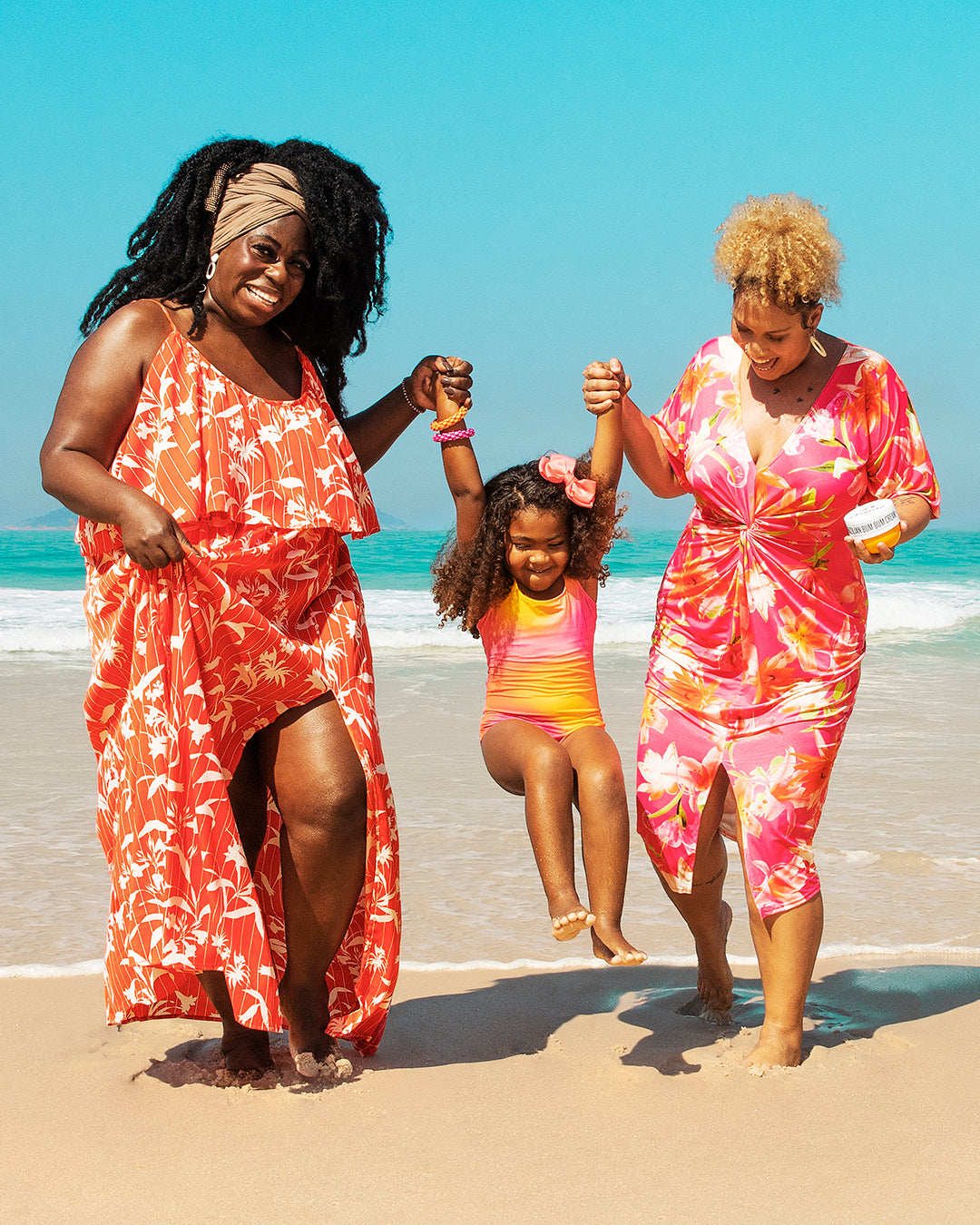 Mother's Day - celebrating on beach and having fun in pretty, colorful dresses