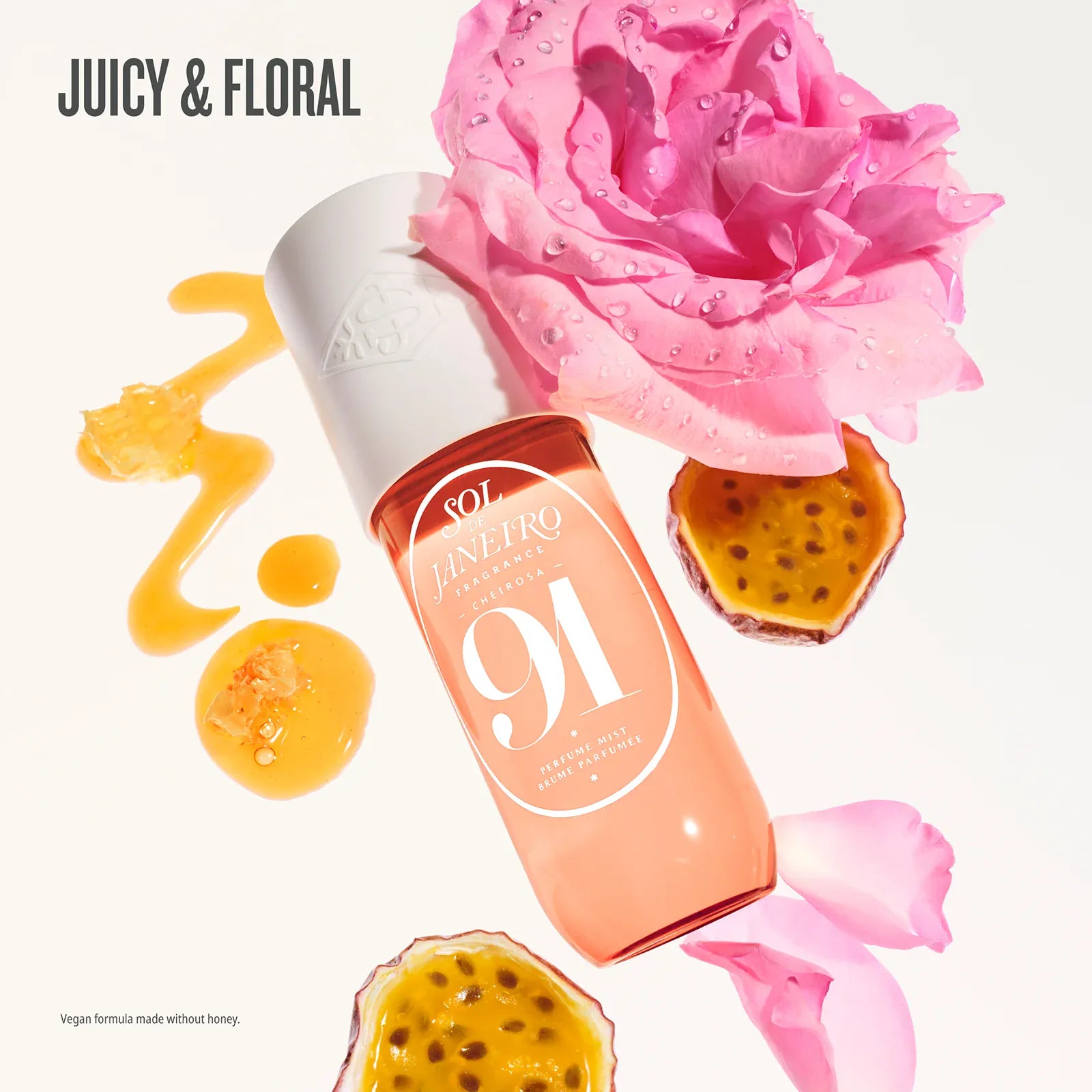 Bottle of nail polish with a pink rose and passion fruit on a white background. Text on image reads juicy & floral