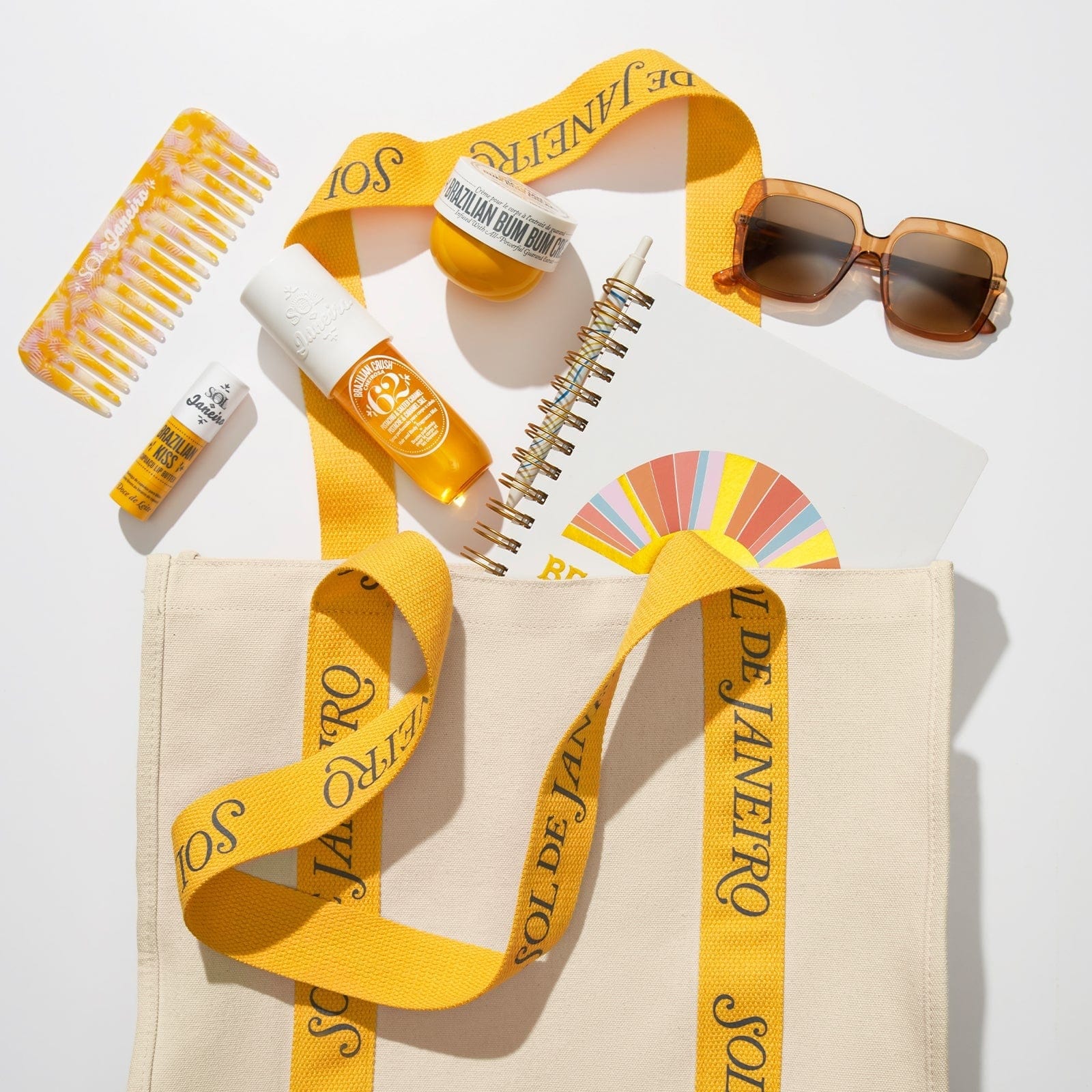 SOL Recycled Canvas Tote Bag with Brazilian Kiss Lip Butter, Brazilian Bum Bum Cream, Cheirosa 62 perfume mist and comb